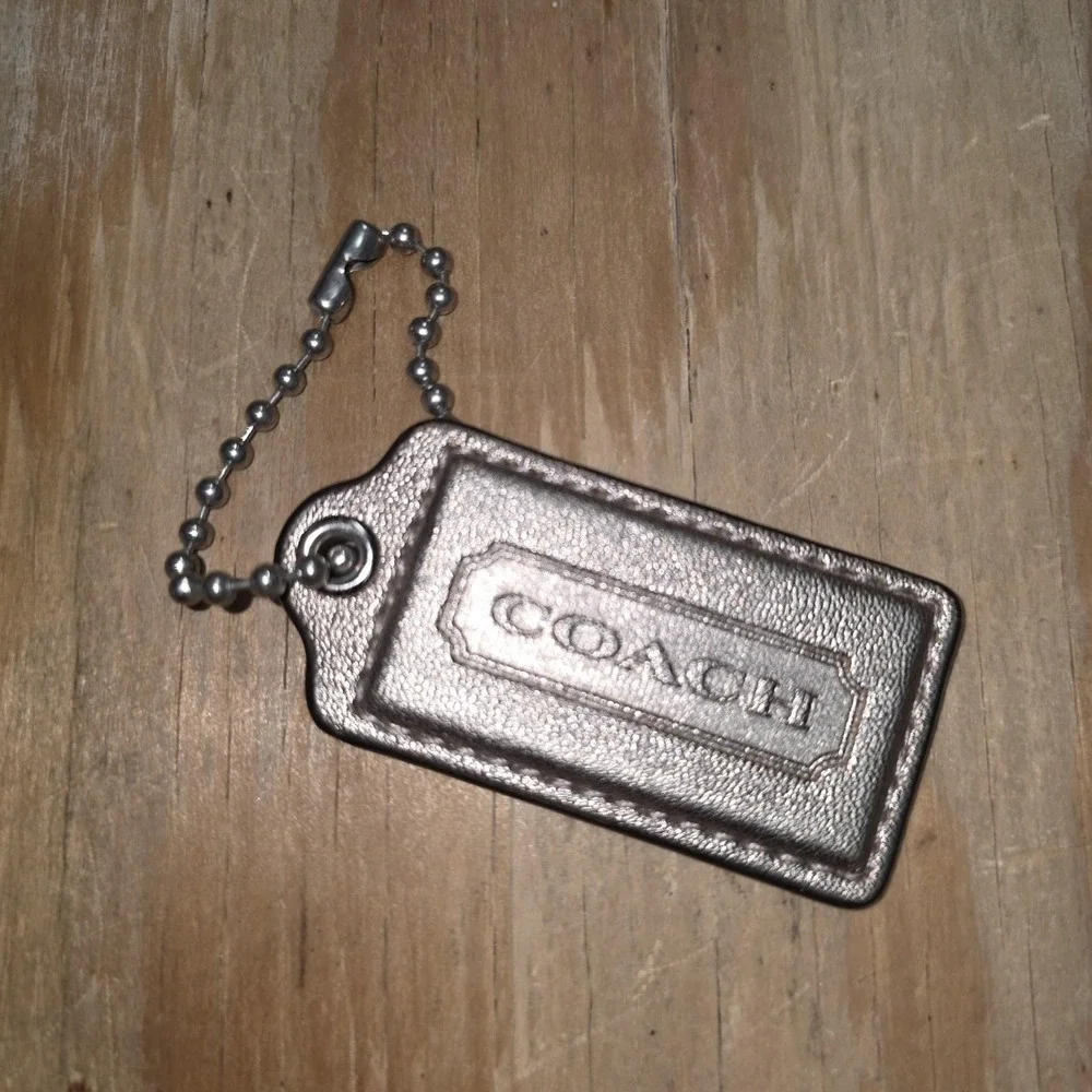 Coach bag tag